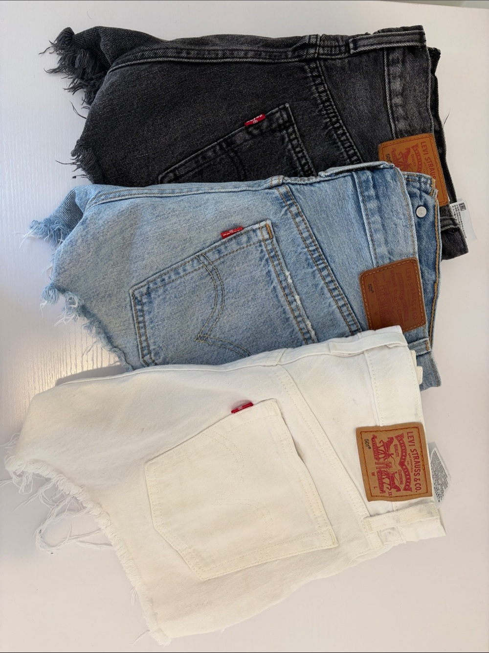 Levi's Women's Cutoff Denim Shorts Trio - Black, Light Blue, White
